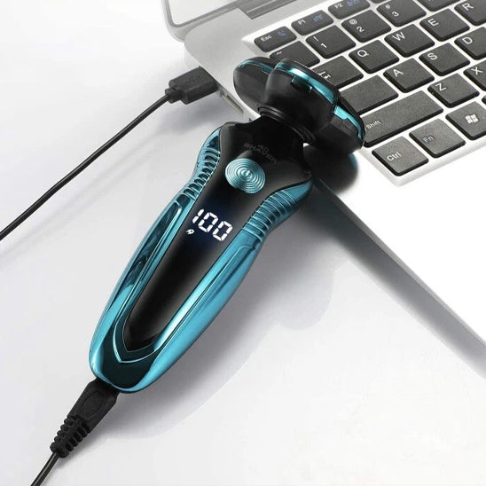rasoir electrique homme en charge sur bureau